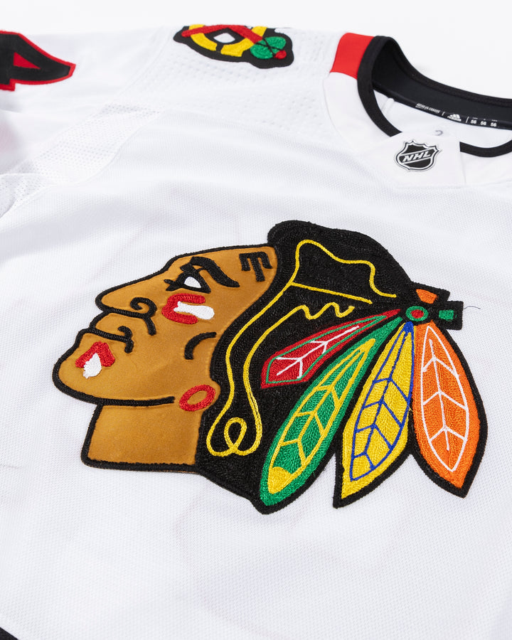 white team issued David Kampf Chicago Blackhawks jersey - front detail lay flat