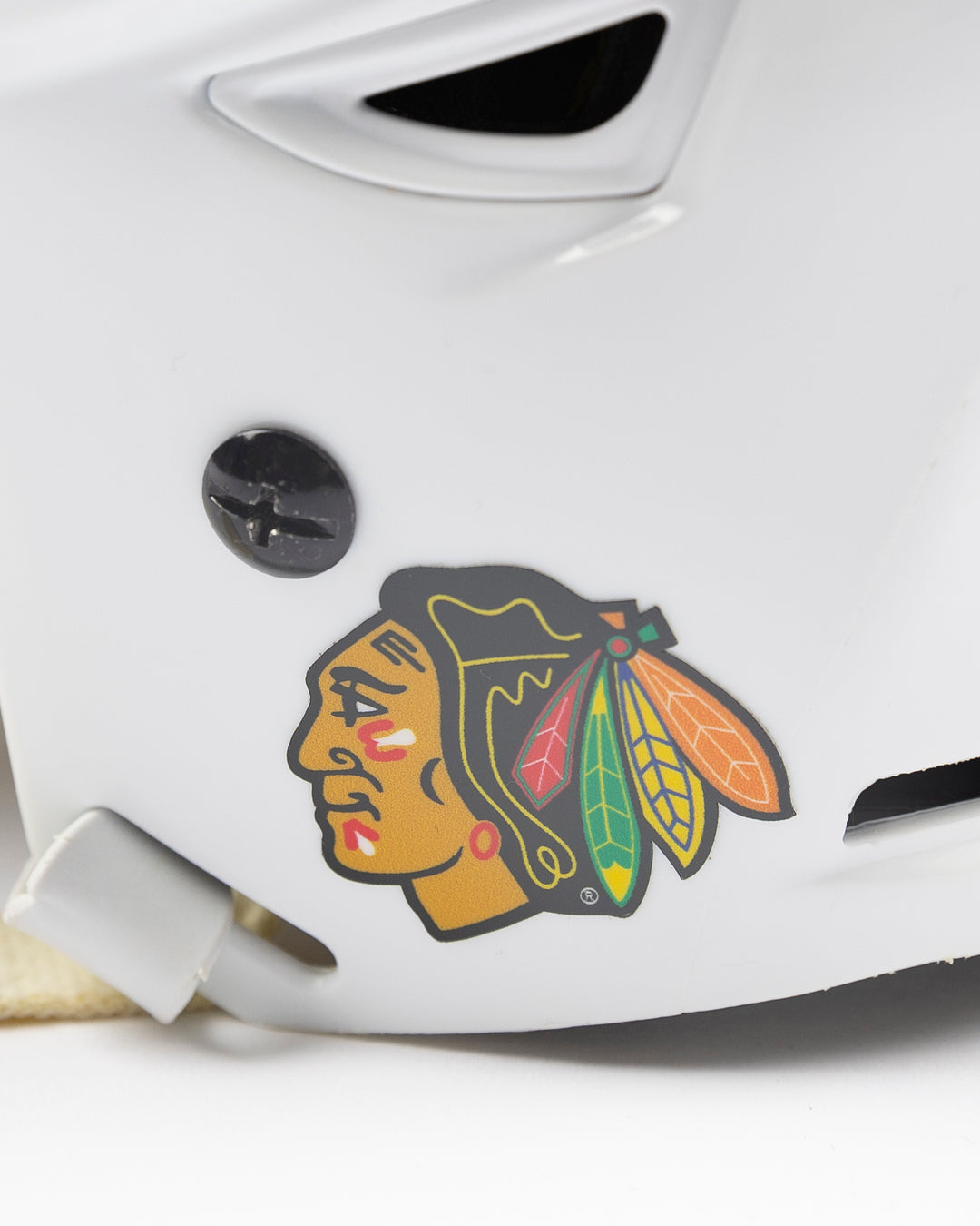 white CCM hockey helmet used by Chicago Blackhawks player Jason Dickinson - alt detail lay flat