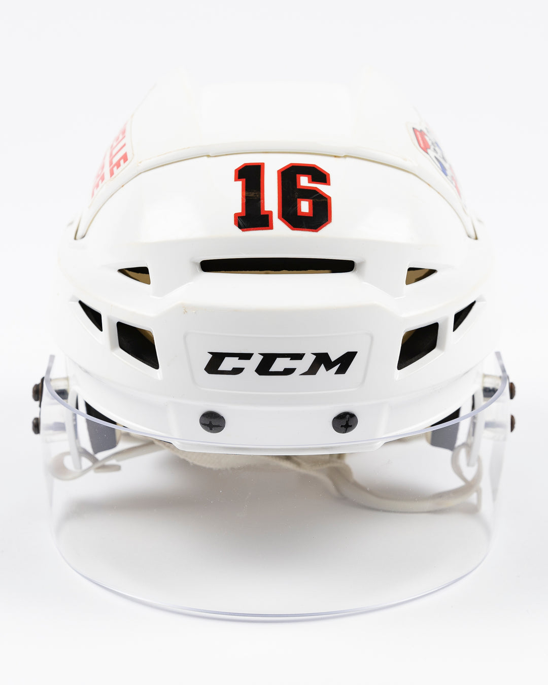 white CCM hockey helmet used by Chicago Blackhawks player Jason Dickinson - front lay flat