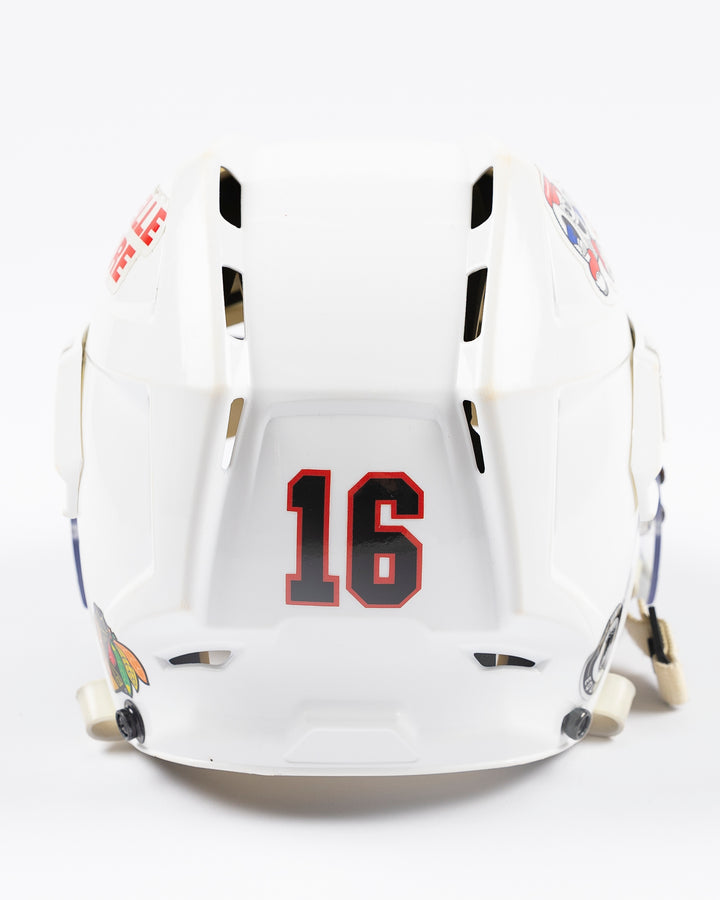 white CCM hockey helmet used by Chicago Blackhawks player Jason Dickinson - back lay flat