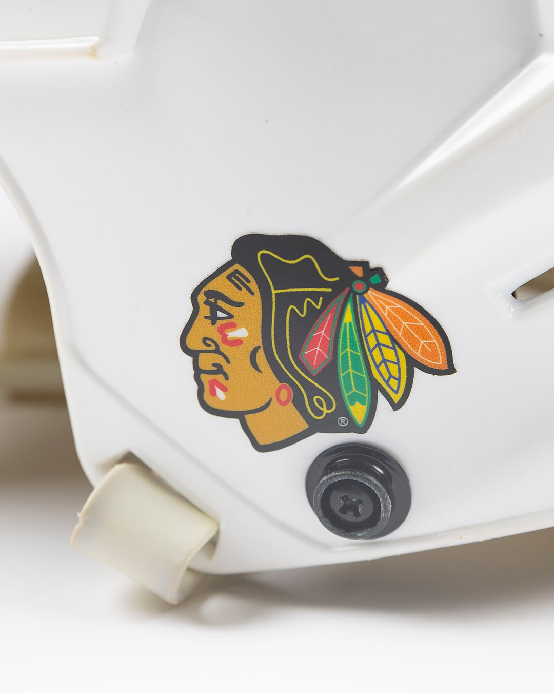 white CCM hockey helmet used by Chicago Blackhawks player Jason Dickinson - alt detail lay flat