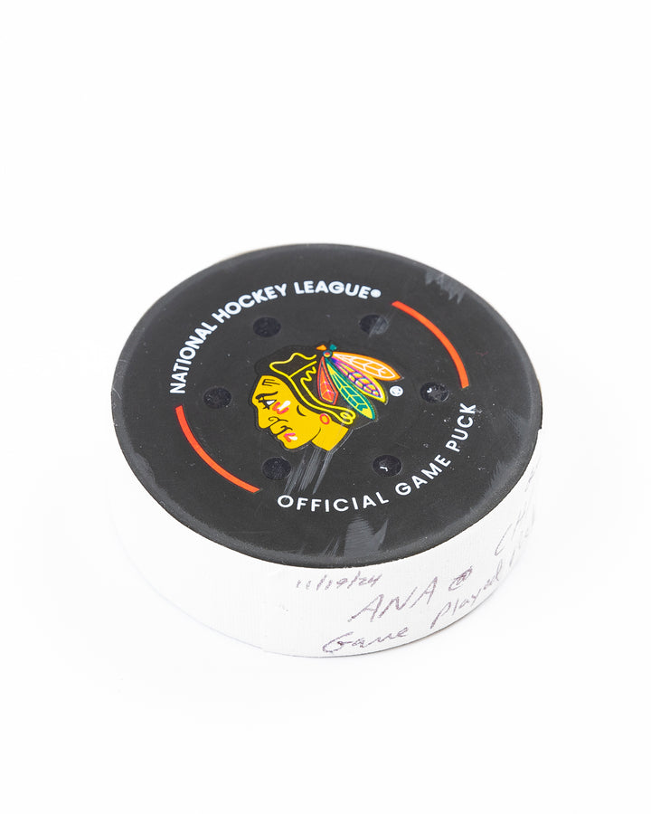 Chicago Blackhawks official game used puck against Anaheim Ducks in November 2024 - front angle lay flat