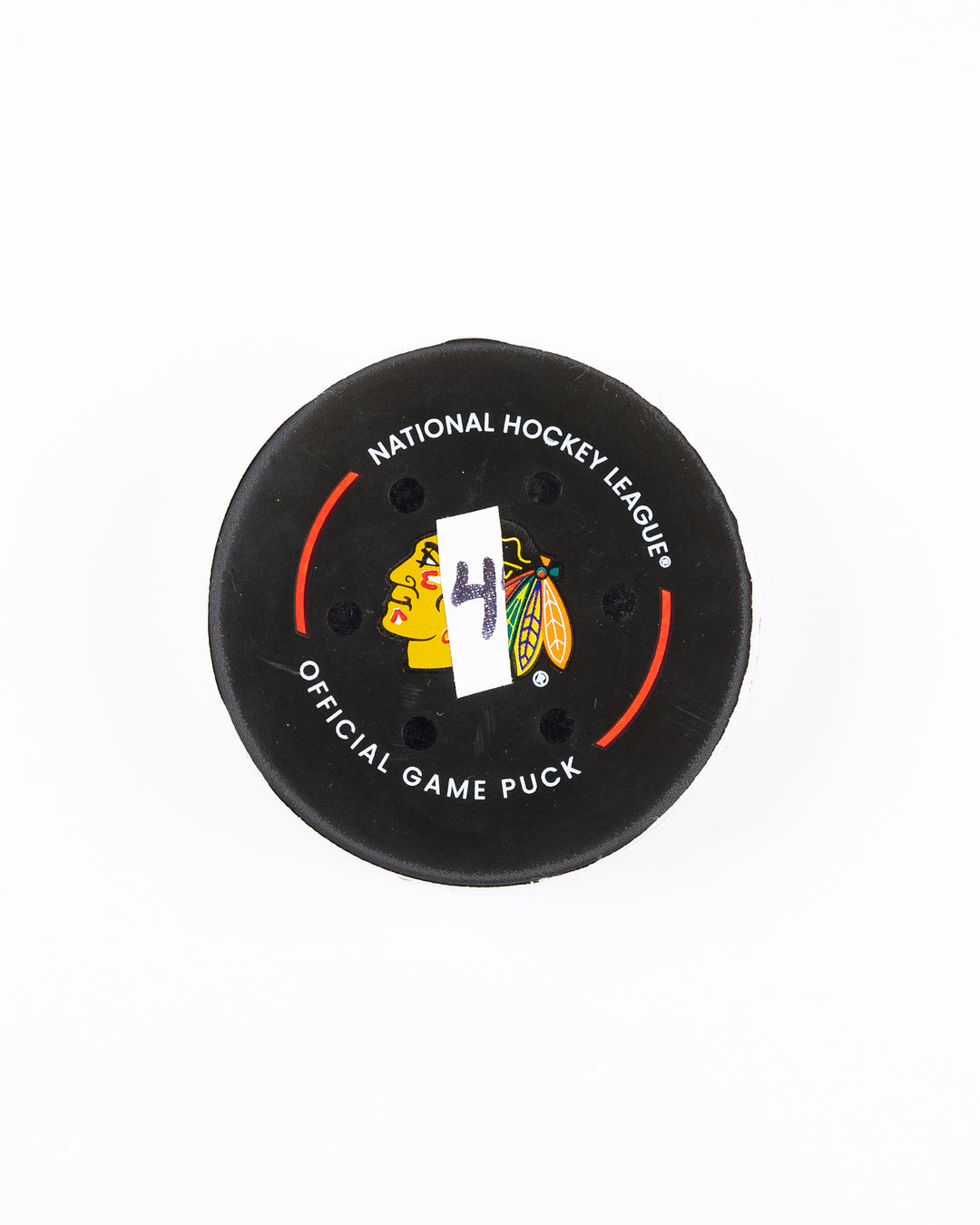 official Chicago Blackhawks hockey goal puck scored by Nick Foligno against the Florida Panthers in November 2024 - front lay flat