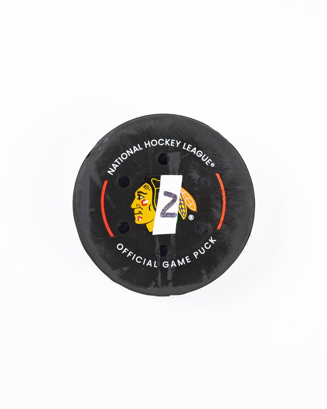 official Chicago Blackhawks hockey goal puck scored by Craig Smith against the Florida Panthers in November 2024 - front lay flat