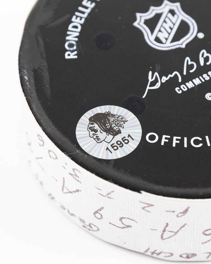 official Chicago Blackhawks hockey goal puck scored by Teuvo Teravainen against the Florida Panthers in November 2024 - hologram sticker detail lay flat