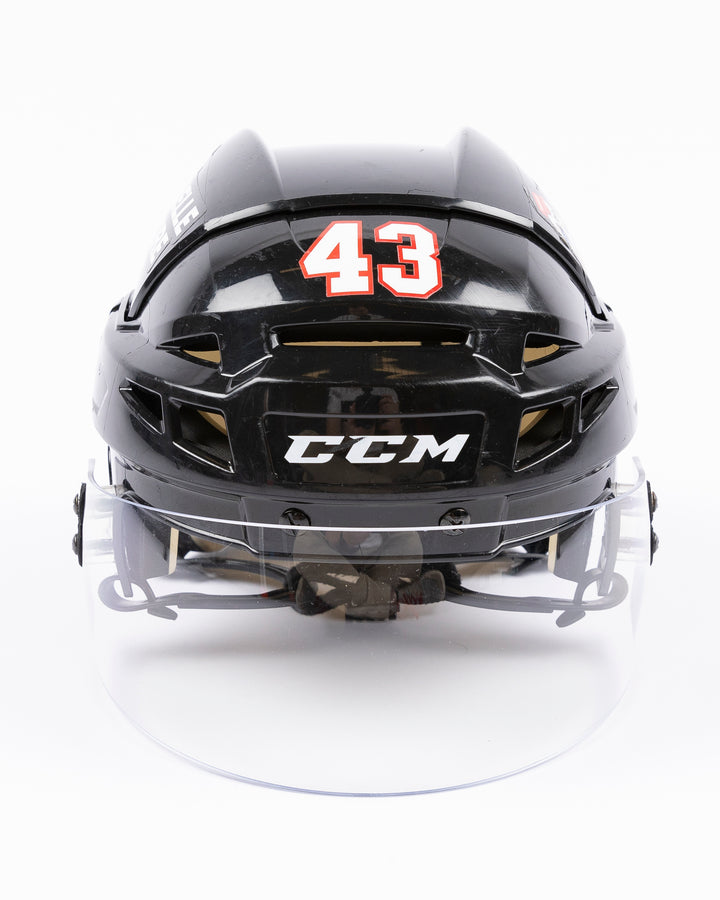 black CCM hockey helmet with number 43 worn by Chicago Blackhawks player Colin Blackwell - front lay flat