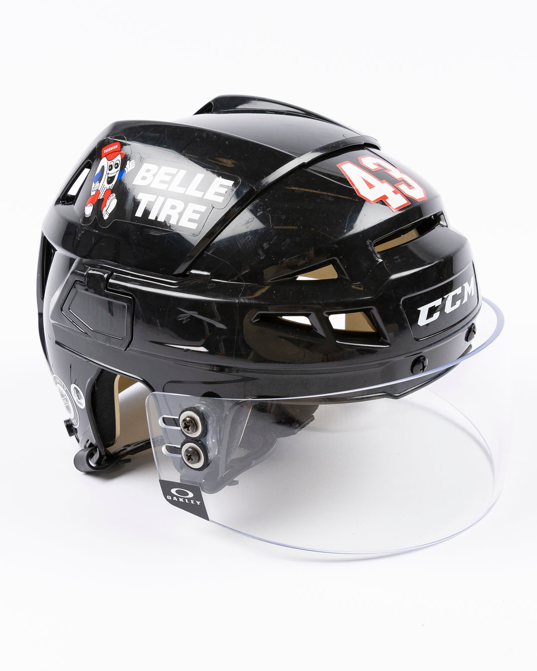 black CCM hockey helmet with number 43 worn by Chicago Blackhawks player Colin Blackwell - right angle lay flat