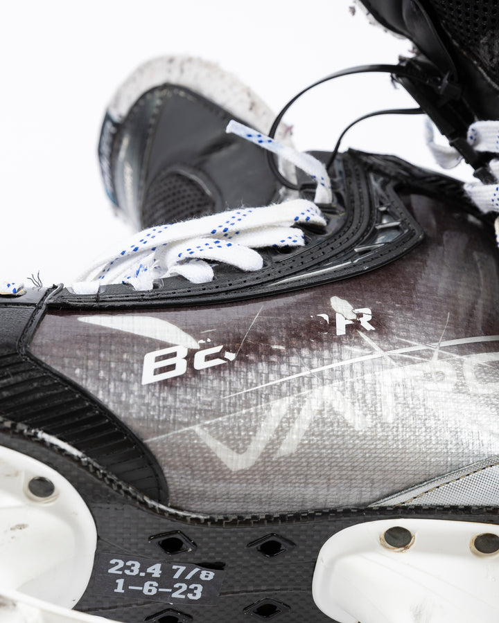 black Bauer hockey skates worn by Chicgo Blackhawks player Philipp Kurashev - side detail lay flat