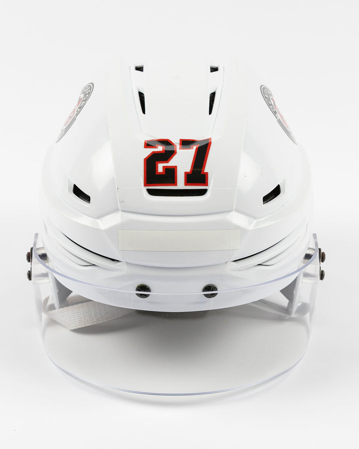 white Warrior AHL helmet used and worn by Rockford IceHogs player Lukas Reichel - 