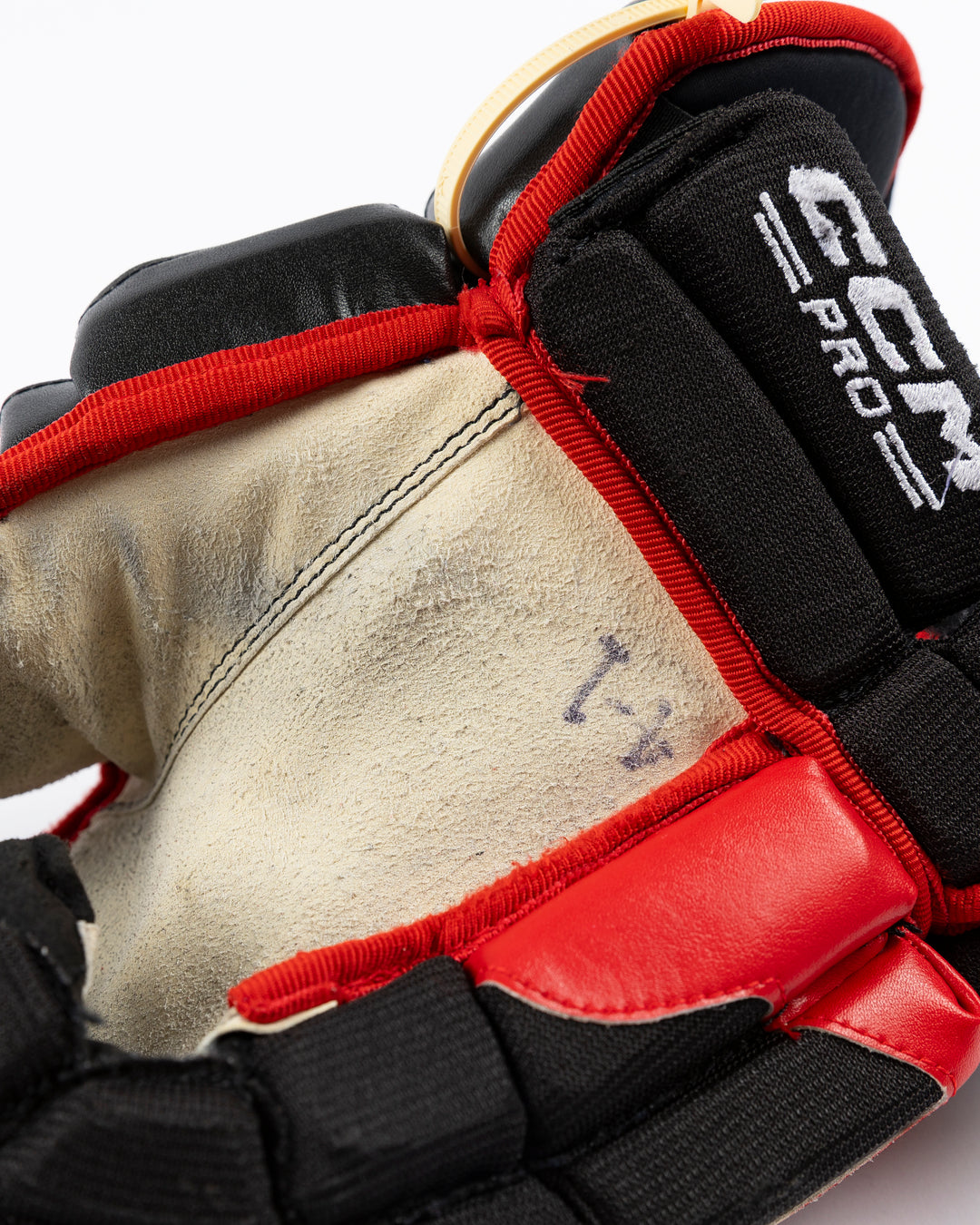 black CCM hockey gloves used by Chicago Blackhawks player Seth Jones - palm detail lay flat