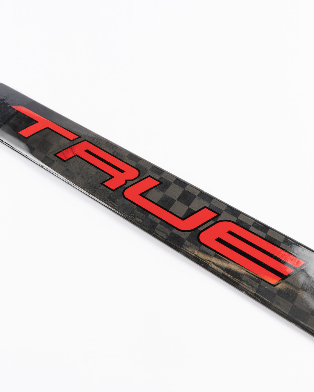 black TRUE hockey stick used by Chicago Blackhawks goalie Arvid Soderblom - TRUE logo detail lay flat