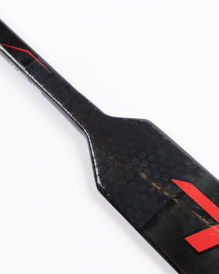 black TRUE hockey stick used by Chicago Blackhawks goalie Arvid Soderblom - stick detail lay flat