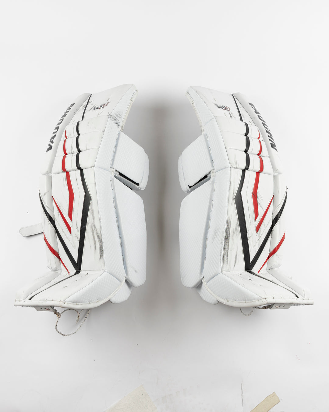 white Vaughn goalie pads used by Chicago Blackhawks goalie Petr Mrazek - front lay flat