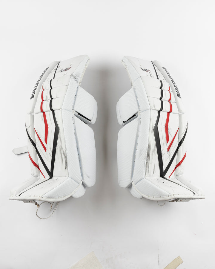 white Vaughn goalie pads used by Chicago Blackhawks goalie Petr Mrazek - front lay flat
