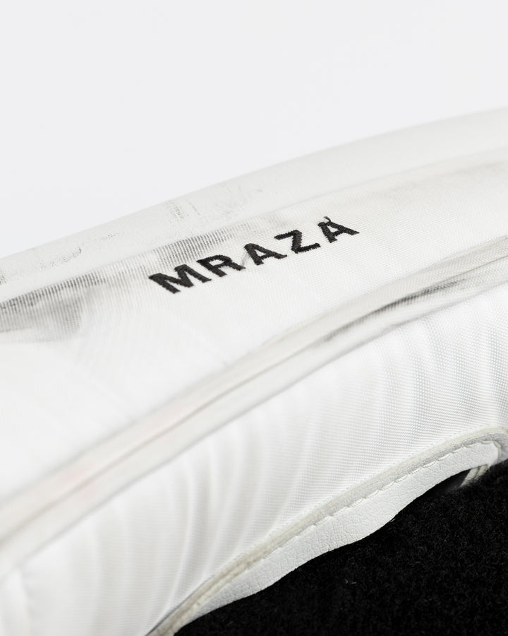 white Vaughn goalie pads used by Chicago Blackhawks goalie Petr Mrazek - name detail lay flat