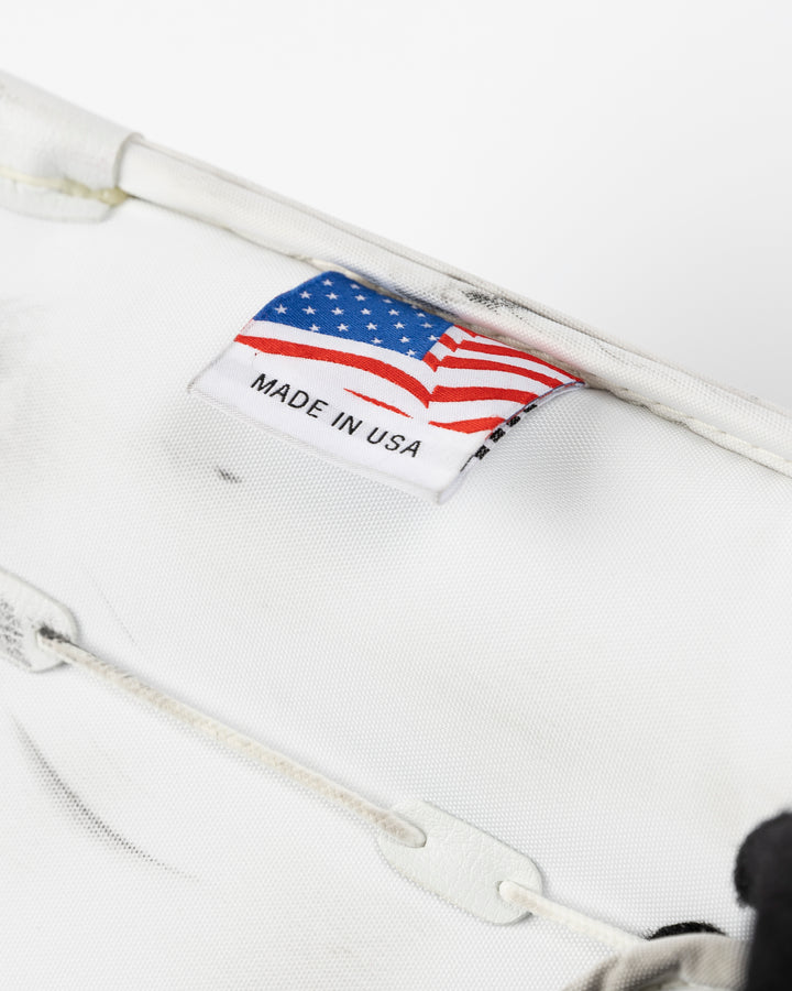 white Vaughn goalie pads used by Chicago Blackhawks goalie Petr Mrazek - made in usa tag lay flat