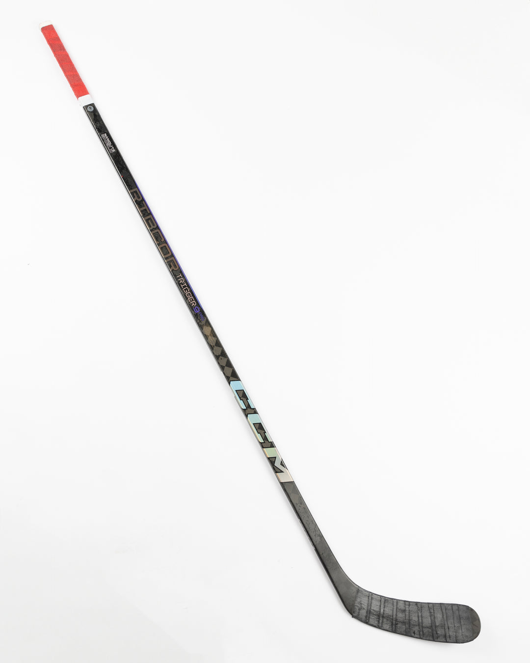 black CCM hockey stick used by Chicago Blackhawks player Taylor Hall - front lay flat