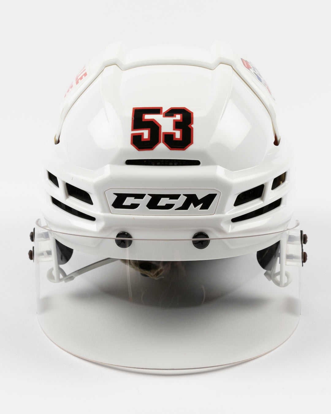 white CCM hockey helmet used by Chicago Blackhawks player Marcel Marcel - front lay flat