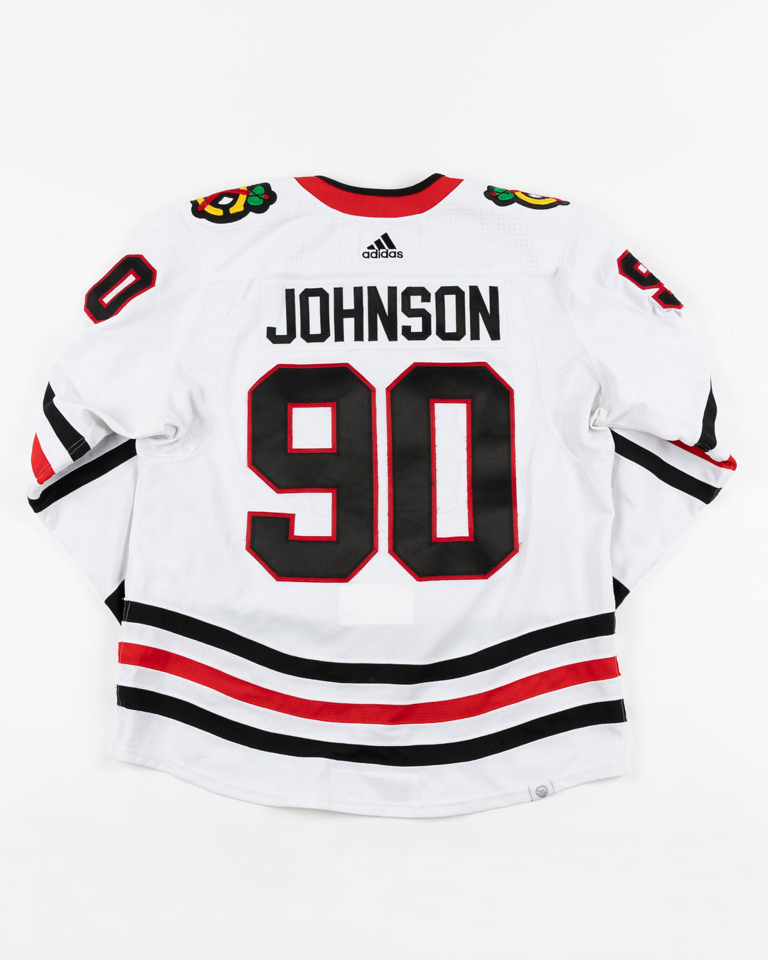 white adidas away Chicago Blackhawks jersey game used by player Tyler Johnson - back lay flat