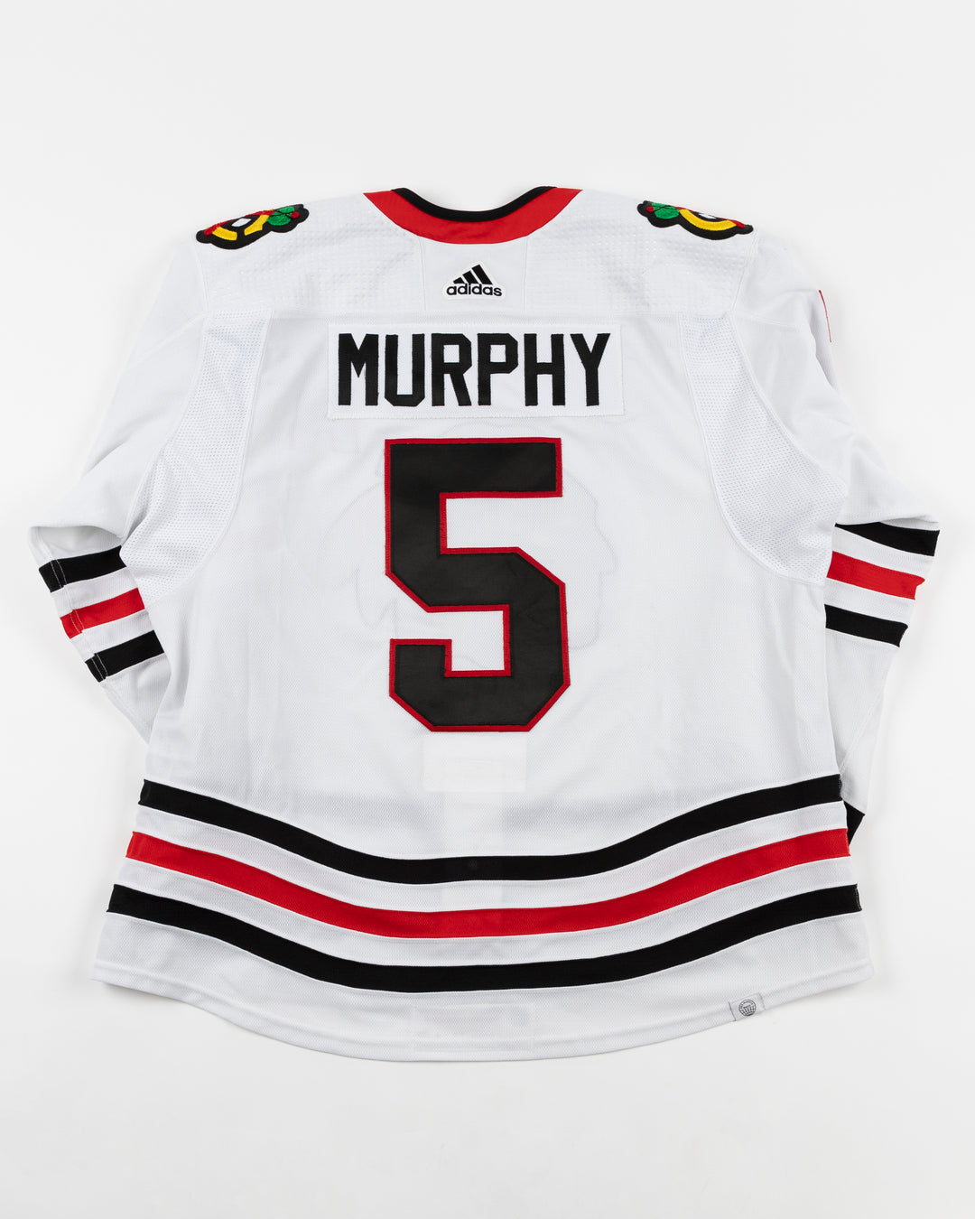 white adidas Chicago Blackhawks jersey game used by alternate captain Connor Murphy - back lay flat