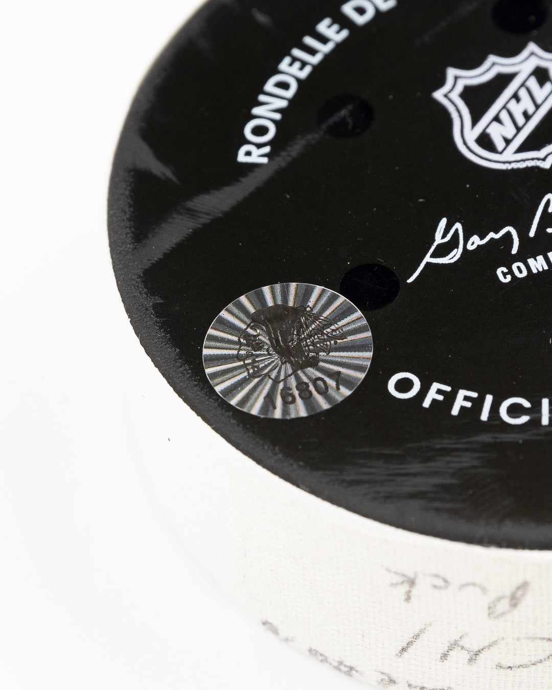 official Chicago Blackhawks game-used hockey puck used in the game against the Montreal Canadiens on January 3, 2025 - hologram sticker detail lay flat