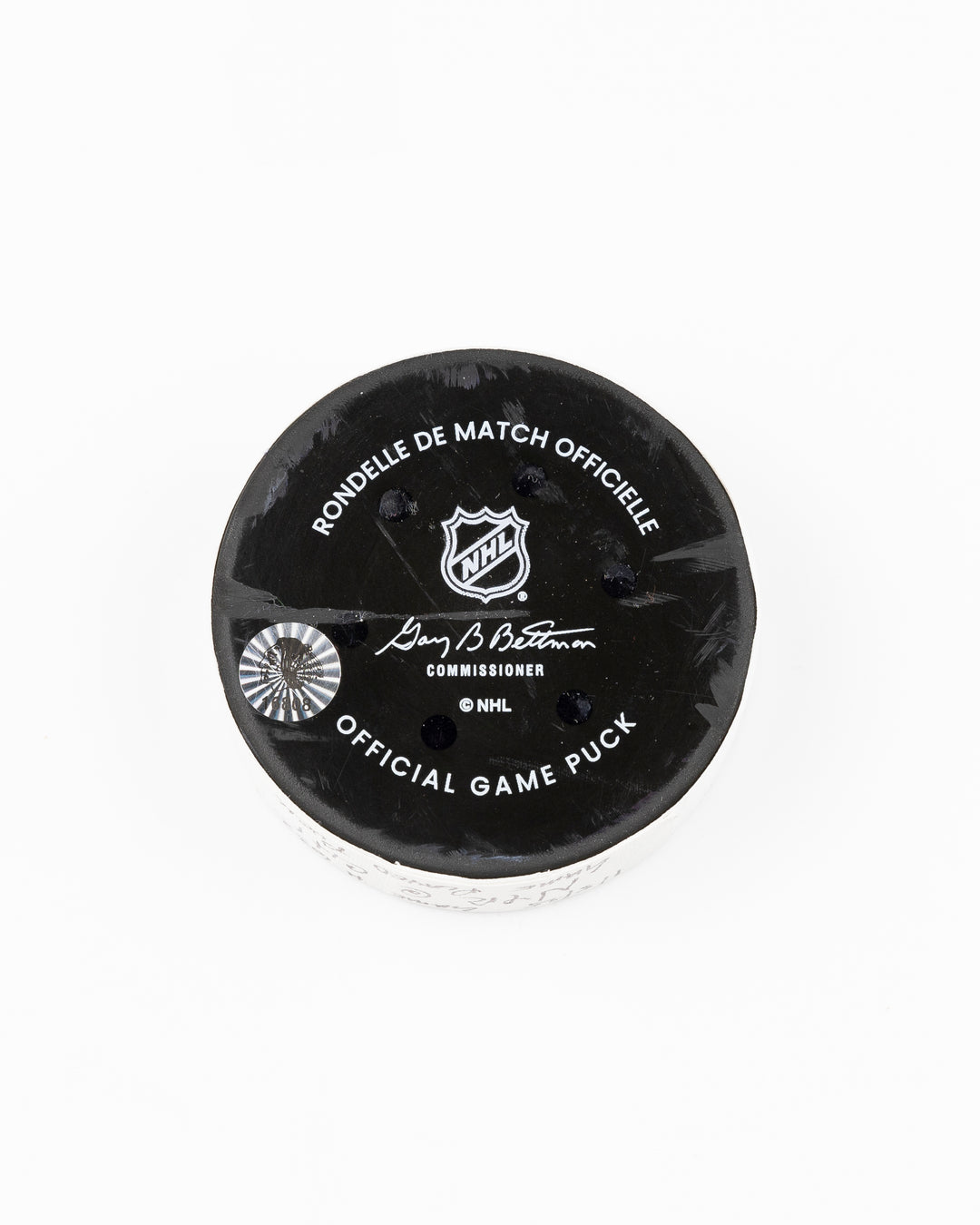 official Chicago Blackhawks game-used hockey puck used during game against the Colorado Avalanche on January 8, 2025 - back lay flat