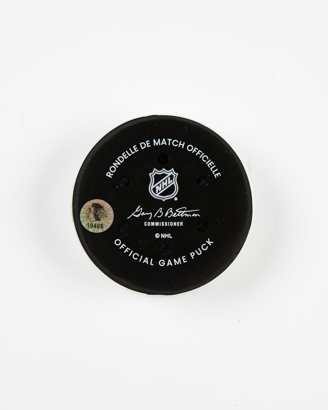 official Chicago Blackhawks game-used puck used in February of 2025 - back lay flat