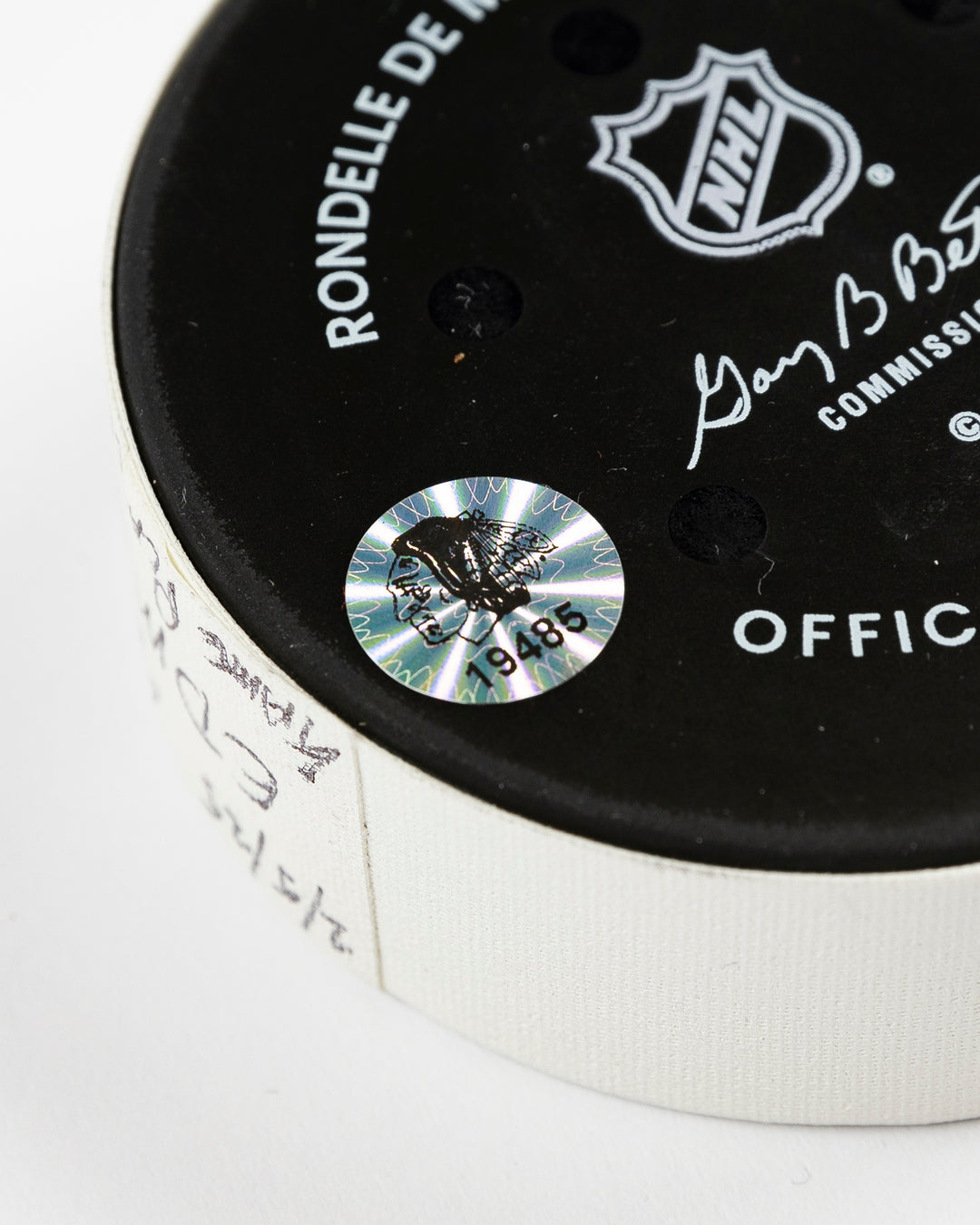 official Chicago Blackhawks game-used puck used in February of 2025 - hologram sticker detail lay flat