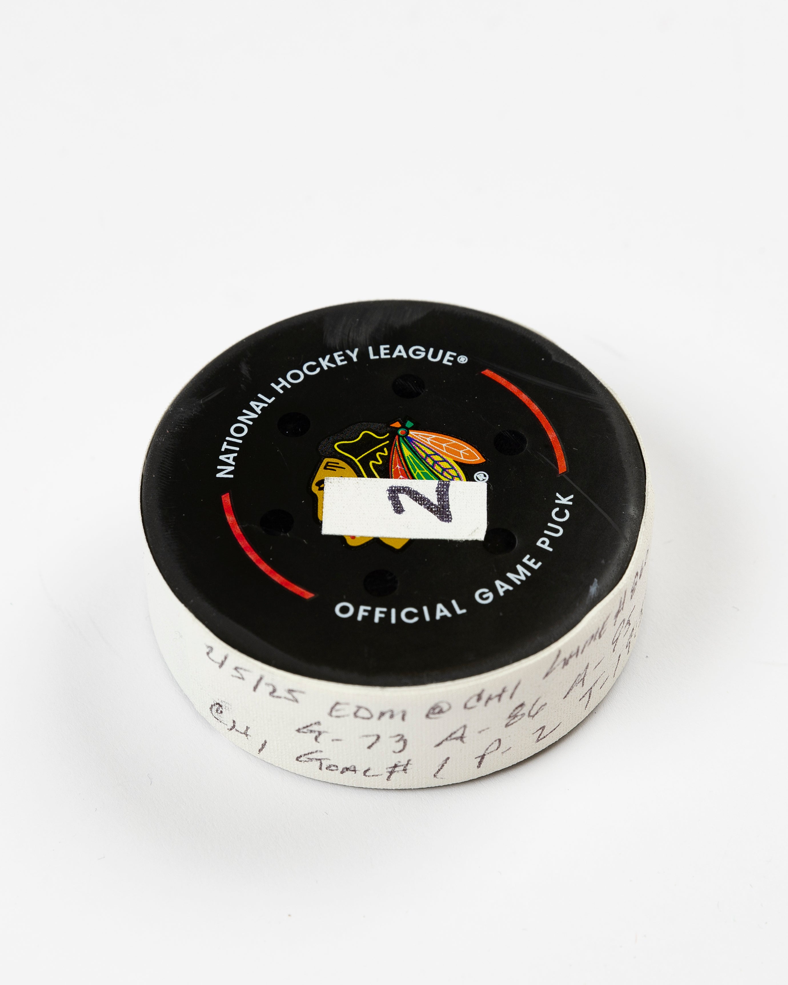 Lukas Reichel Game-Used Goal Puck 2/5/25 19482 – CBH Shop