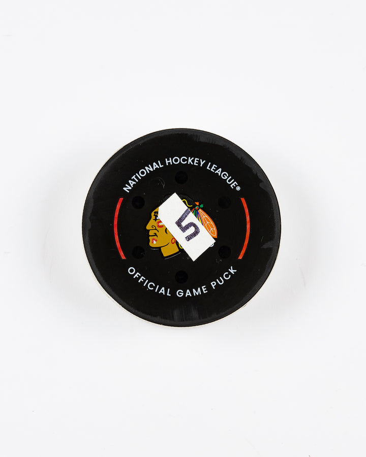 official Chicago Blackhawks game-used goal hockey puck scored by Ryan Donato against the Edmonton Oilers on February 5, 2025 - front lay flat