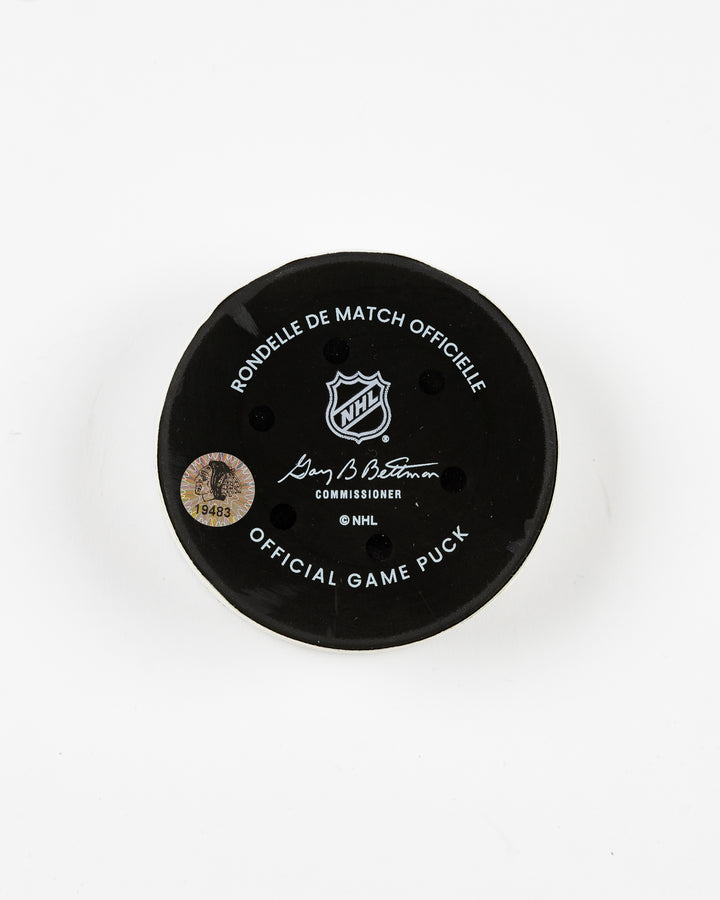 official Chicago Blackhawks game-used goal hockey puck scored by Ryan Donato against the Edmonton Oilers on February 5, 2025 - back lay flat