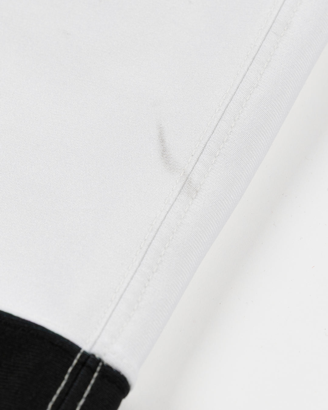 white adidas hockey socks used by Chicago Blackhawks goalie Petr Mrazek - scuff detail lay flat