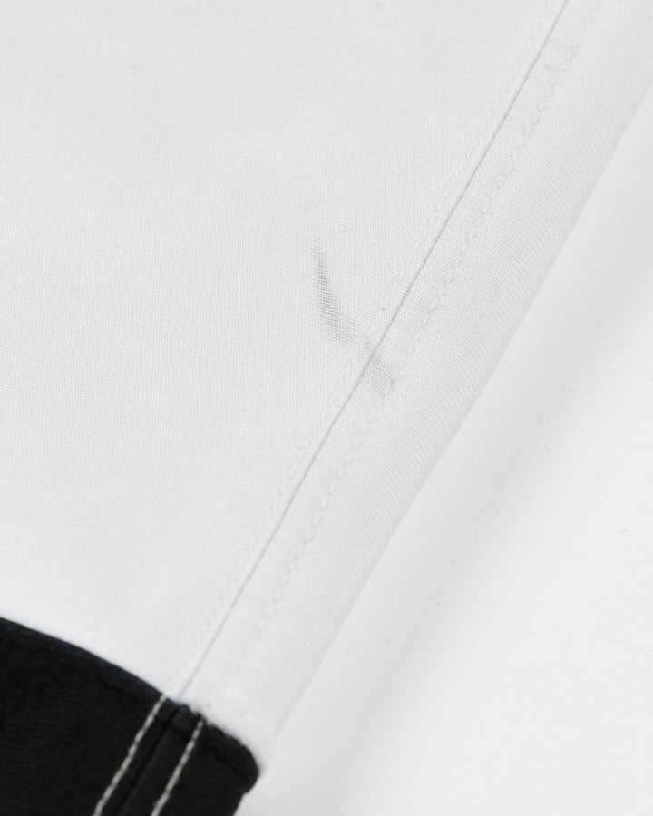 white adidas hockey socks used by Chicago Blackhawks goalie Petr Mrazek - scuff detail lay flat