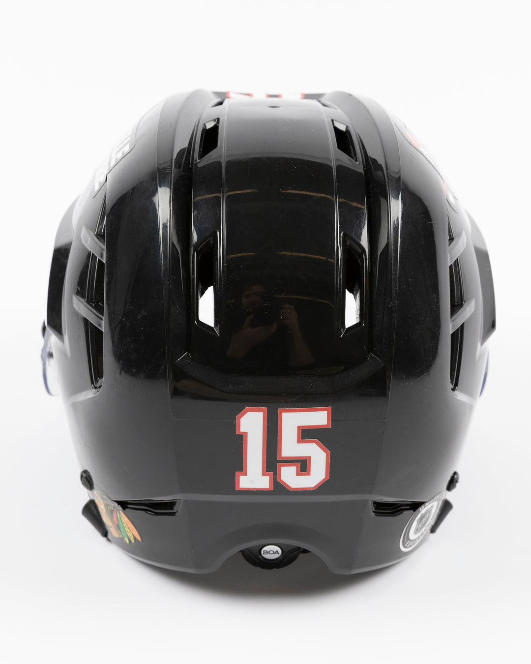 black Warrior brand hockey helmet used by Chicago Blackhawks player Joey Anderson - back lay flat