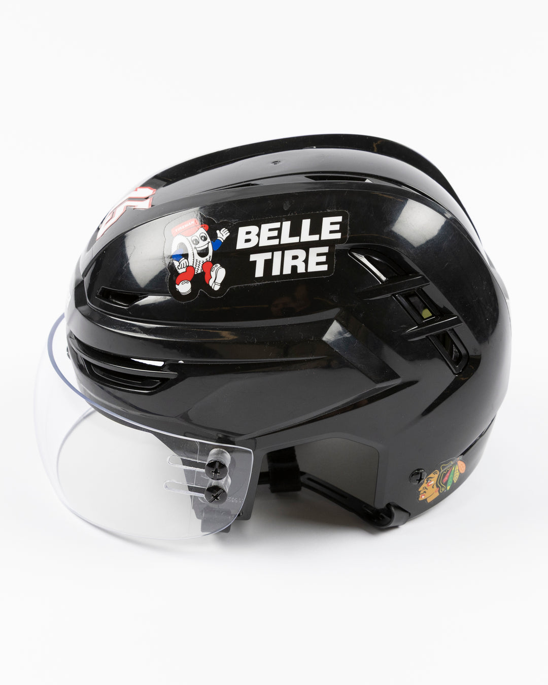 black Warrior brand hockey helmet used by Chicago Blackhawks player Joey Anderson - left side lay flat
