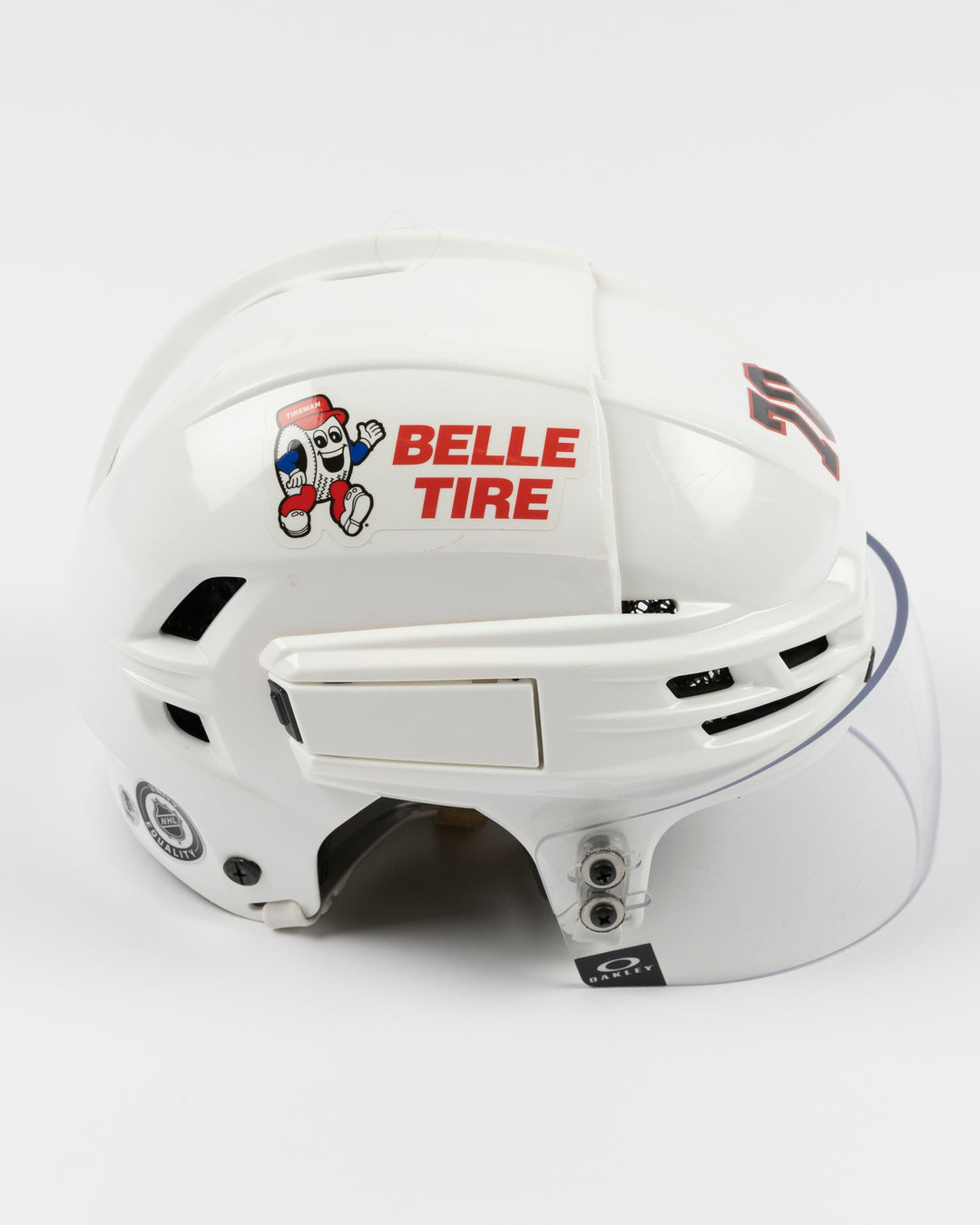 white CCM hockey helmet worn and used by Chicago Blackhawks player Cole Guttman - right side lay flat