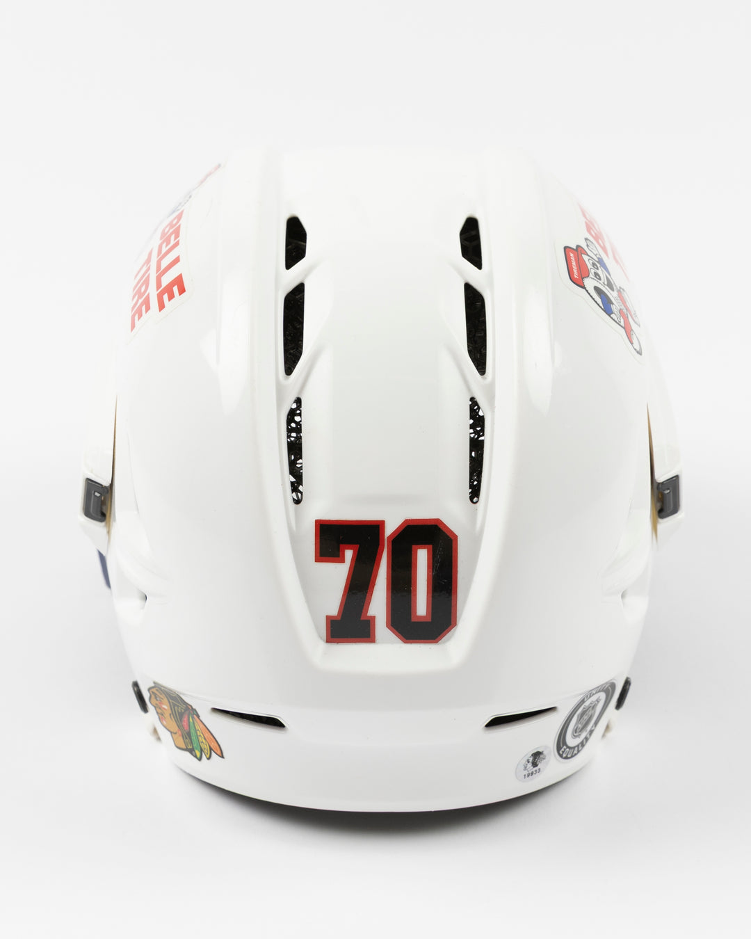 white CCM hockey helmet worn and used by Chicago Blackhawks player Cole Guttman - back lay flat
