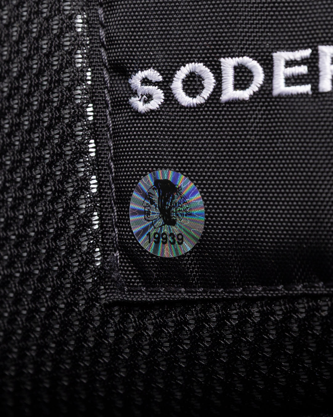 black Vaugh hockey pants used by Chicago Blackhawks goalie Arvid Soderblom - hologram sticker detail lay flat