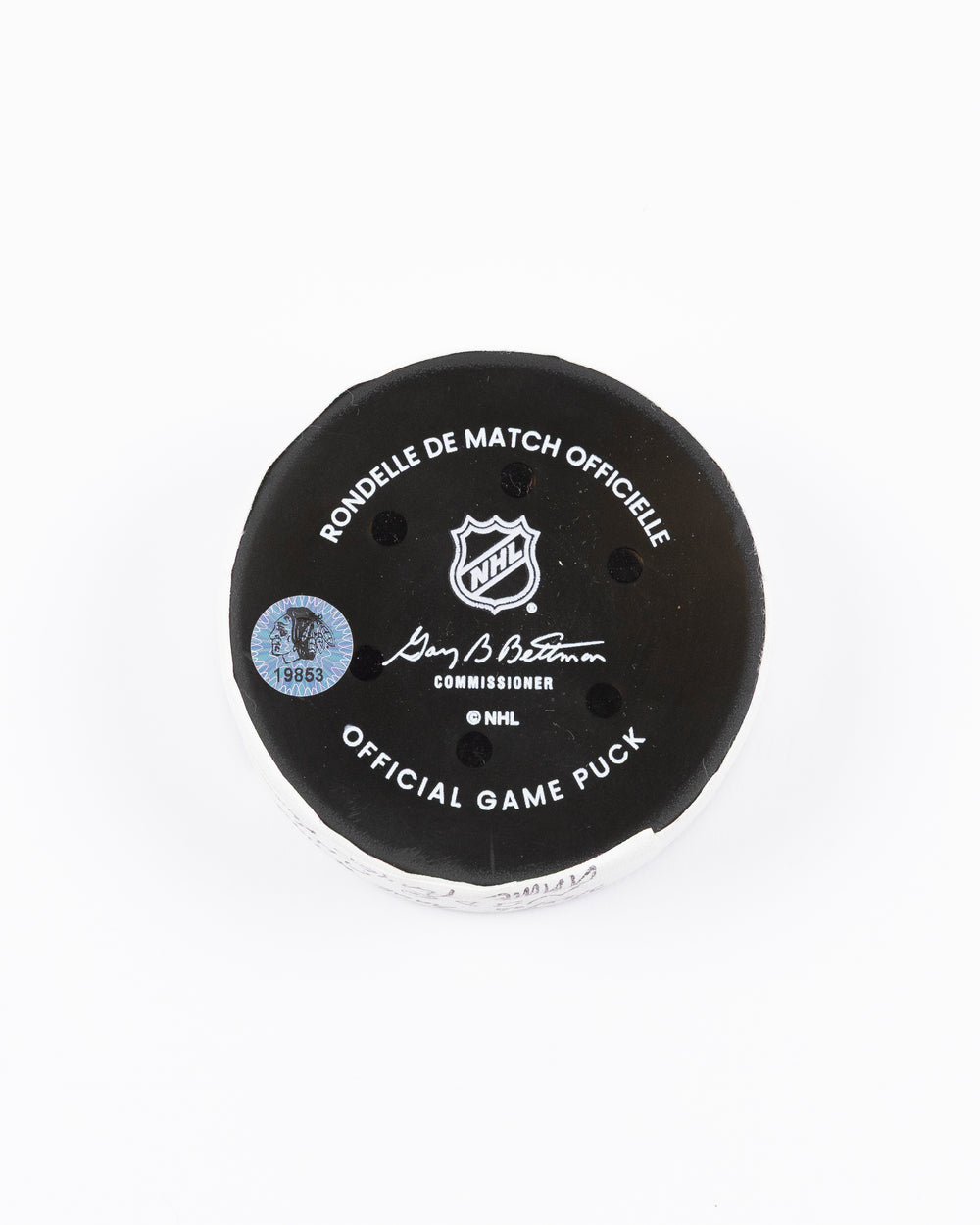 official Chicago Blackhawks hockey puck used in game against the New Jersey Devils on 3/26/25 - back lay flat