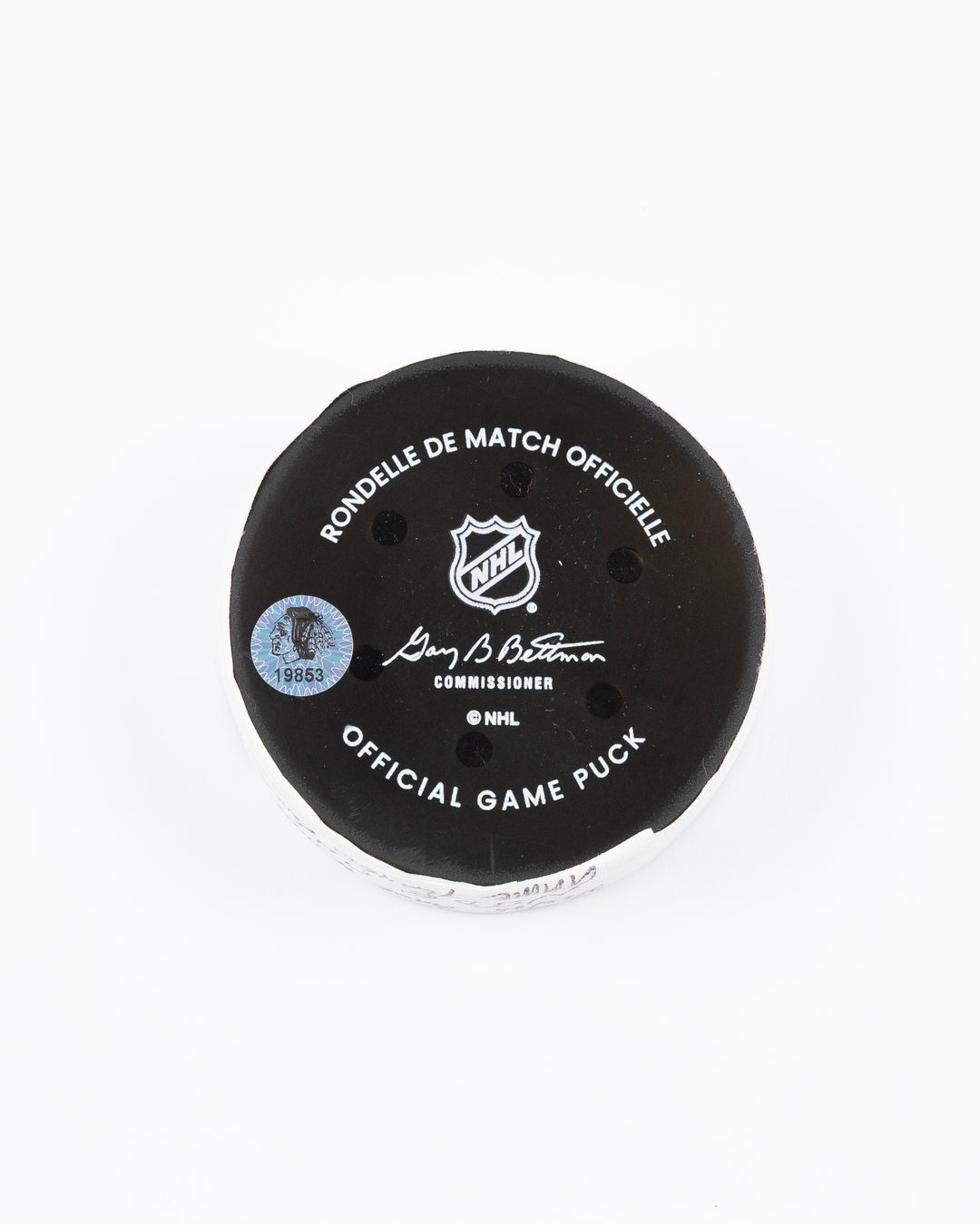 official Chicago Blackhawks hockey puck used in game against the New Jersey Devils on 3/26/25 - back lay flat