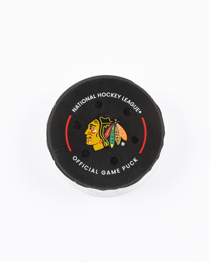 official Chicago Blackhawks hockey puck used in game against the Colorado Avalanche on 4/2/25 - front lay flat