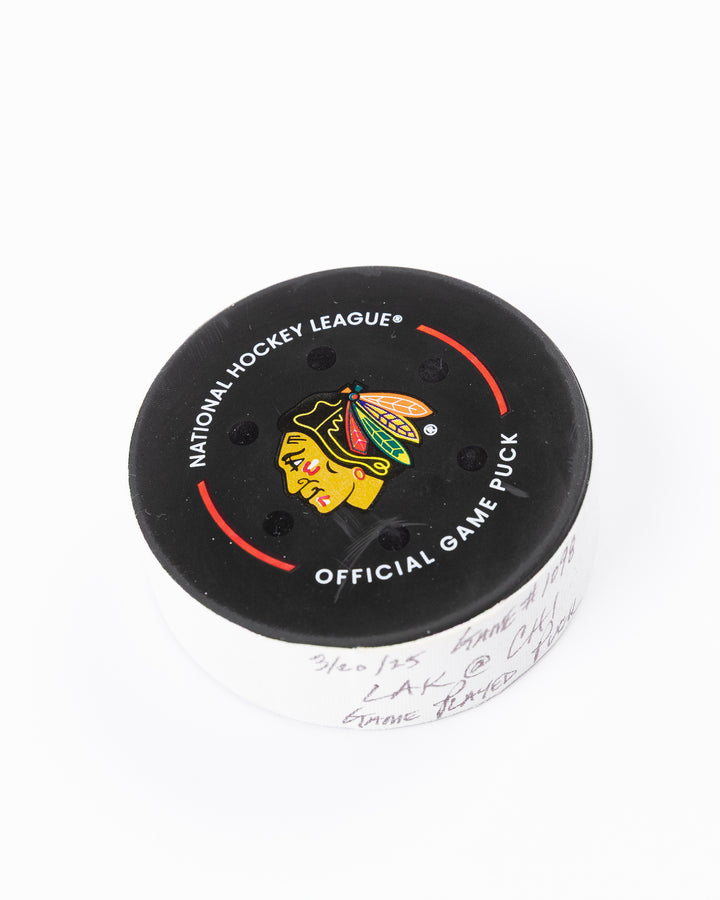 official Chicago Blackhawks hockey puck used in game against Los Angles Kings on 3/20/5 - front angle lay flat