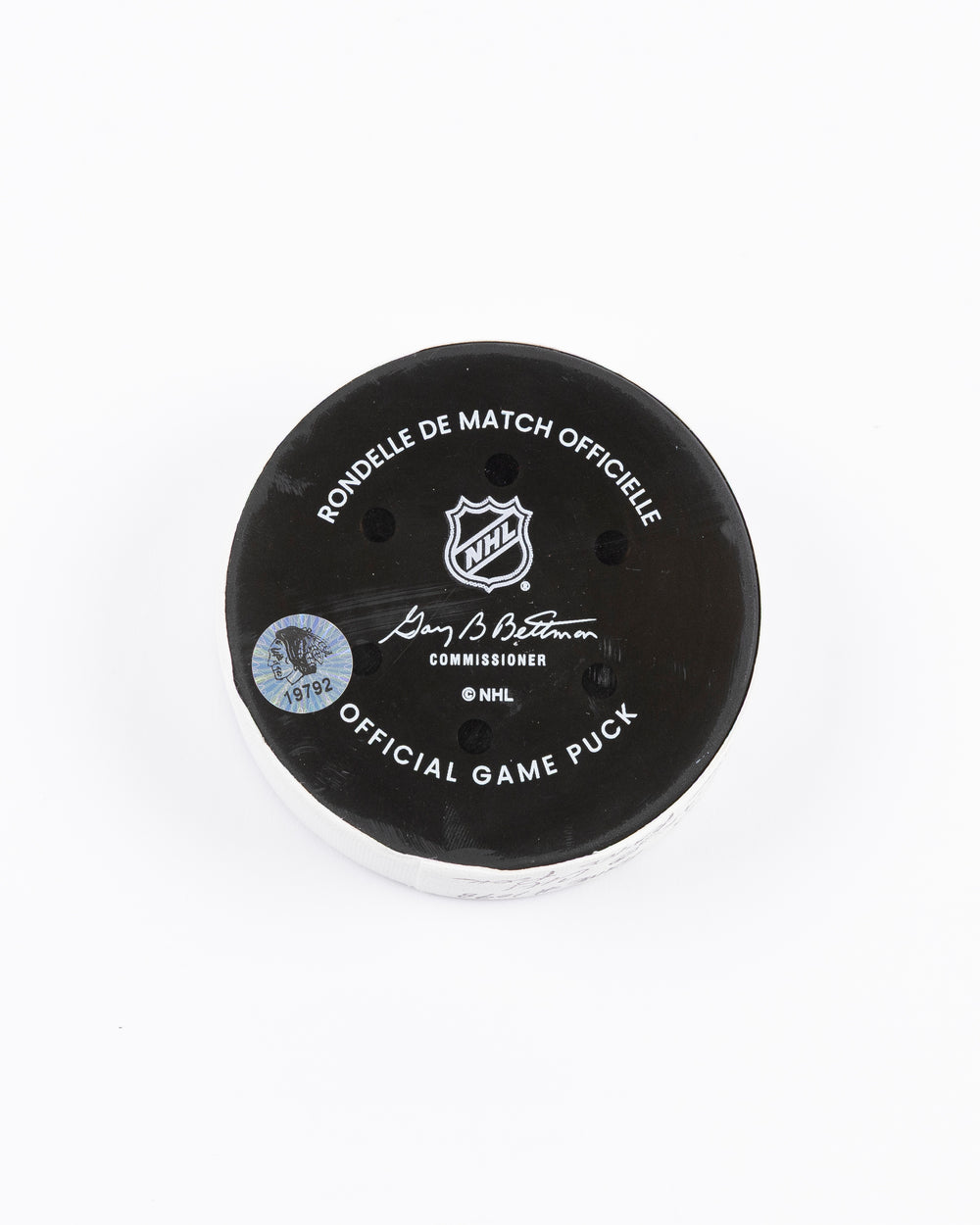 official Chicago Blackhawks hockey puck used in game against Los Angles Kings on 3/20/5 - back lay flat