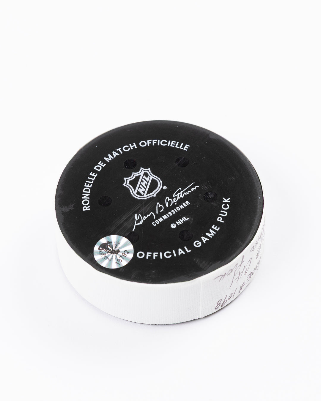official Chicago Blackhawks hockey puck used in game against Los Angles Kings on 3/20/5 - back angle lay flat