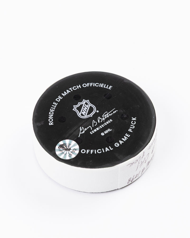 official Chicago Blackhawks hockey puck used in game against Los Angles Kings on 3/20/5 - back angle lay flat