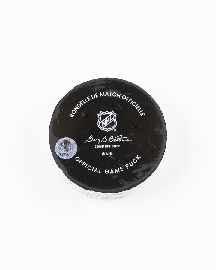 official Chicago Blackhawks game-used hockey puck against Ottawa Senators on March 5, 2025 - back lay flat