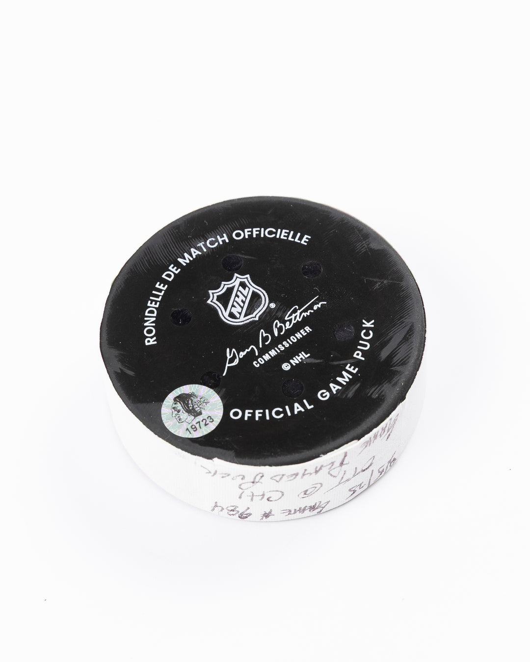 official Chicago Blackhawks game-used hockey puck against Ottawa Senators on March 5, 2025 - back angle lay flat