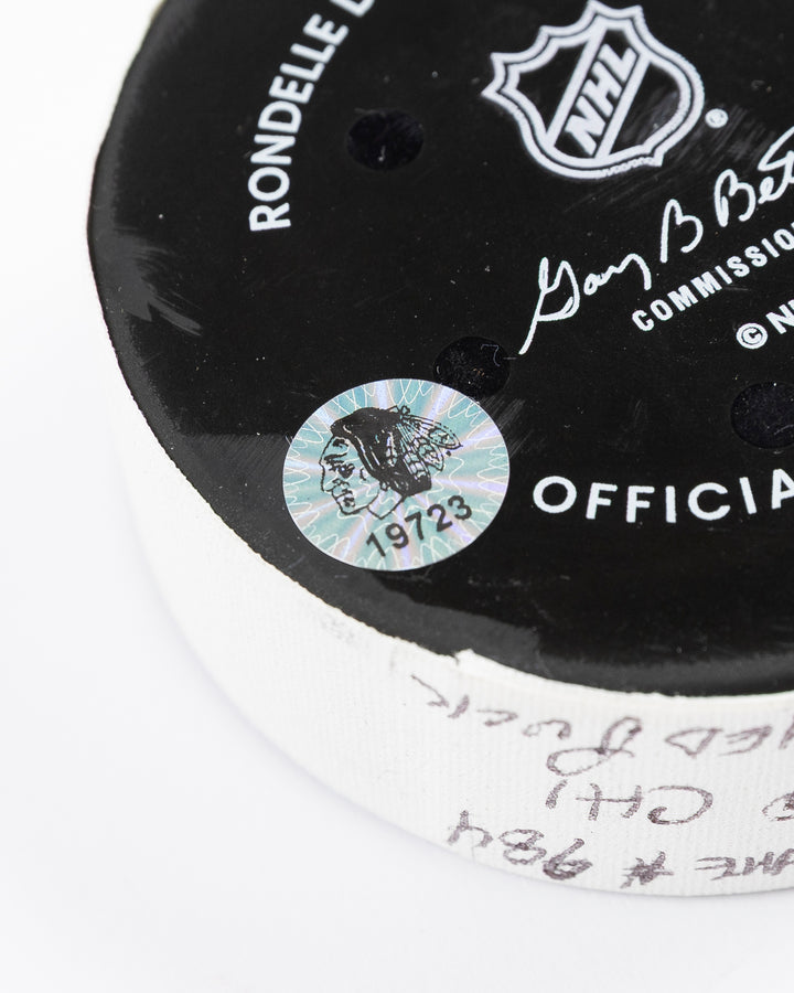official Chicago Blackhawks game-used hockey puck against Ottawa Senators on March 5, 2025 - hologram sticker detail lay flat