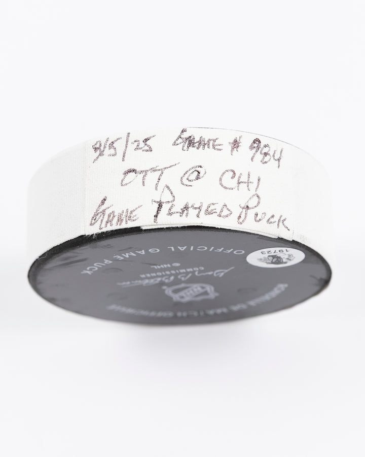 official Chicago Blackhawks game-used hockey puck against Ottawa Senators on March 5, 2025 - tape detail lay flat