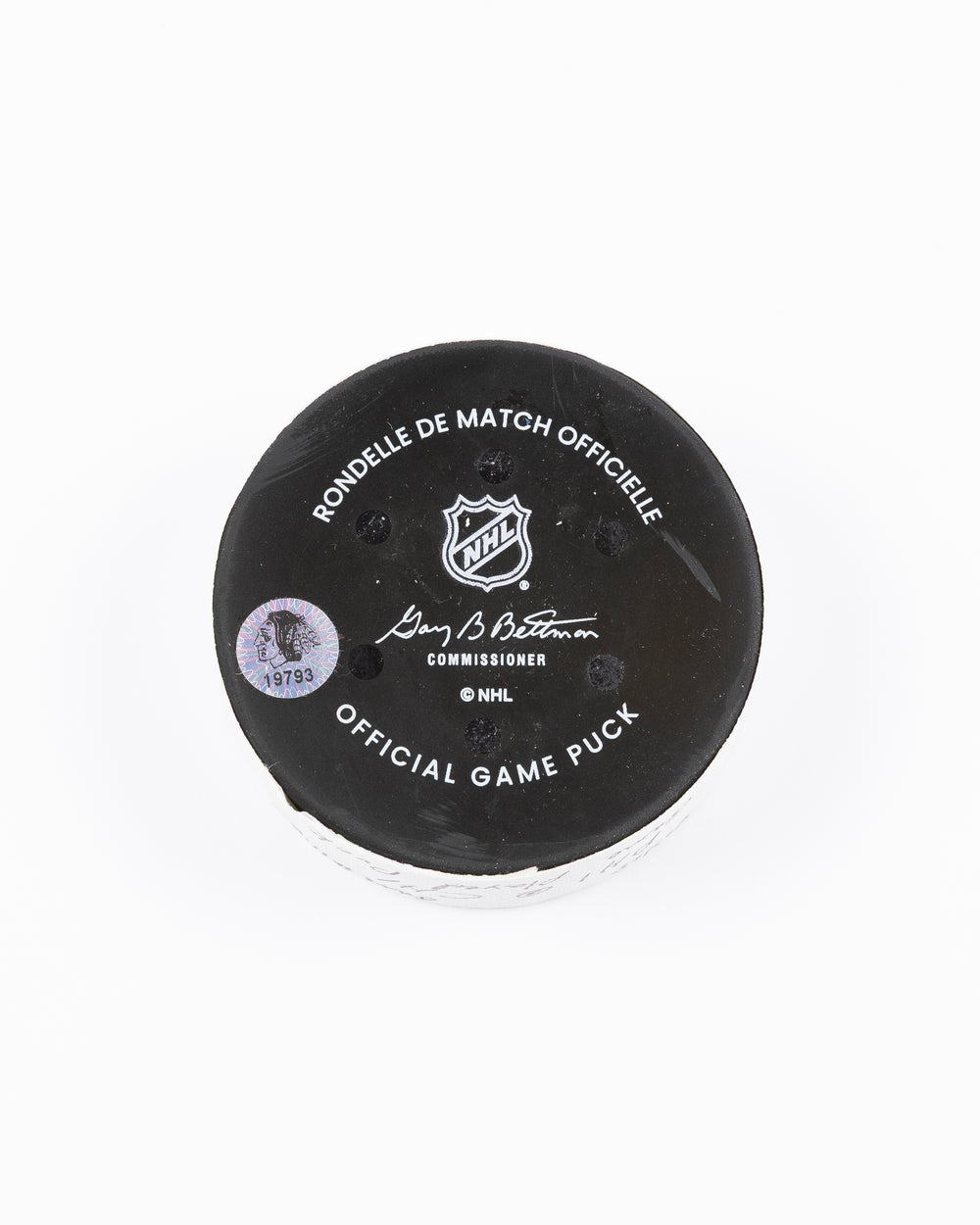 official Chicago Blackhawks hockey puck used in game against Philadelphia Flyers on 3/23/25 - back lay flat